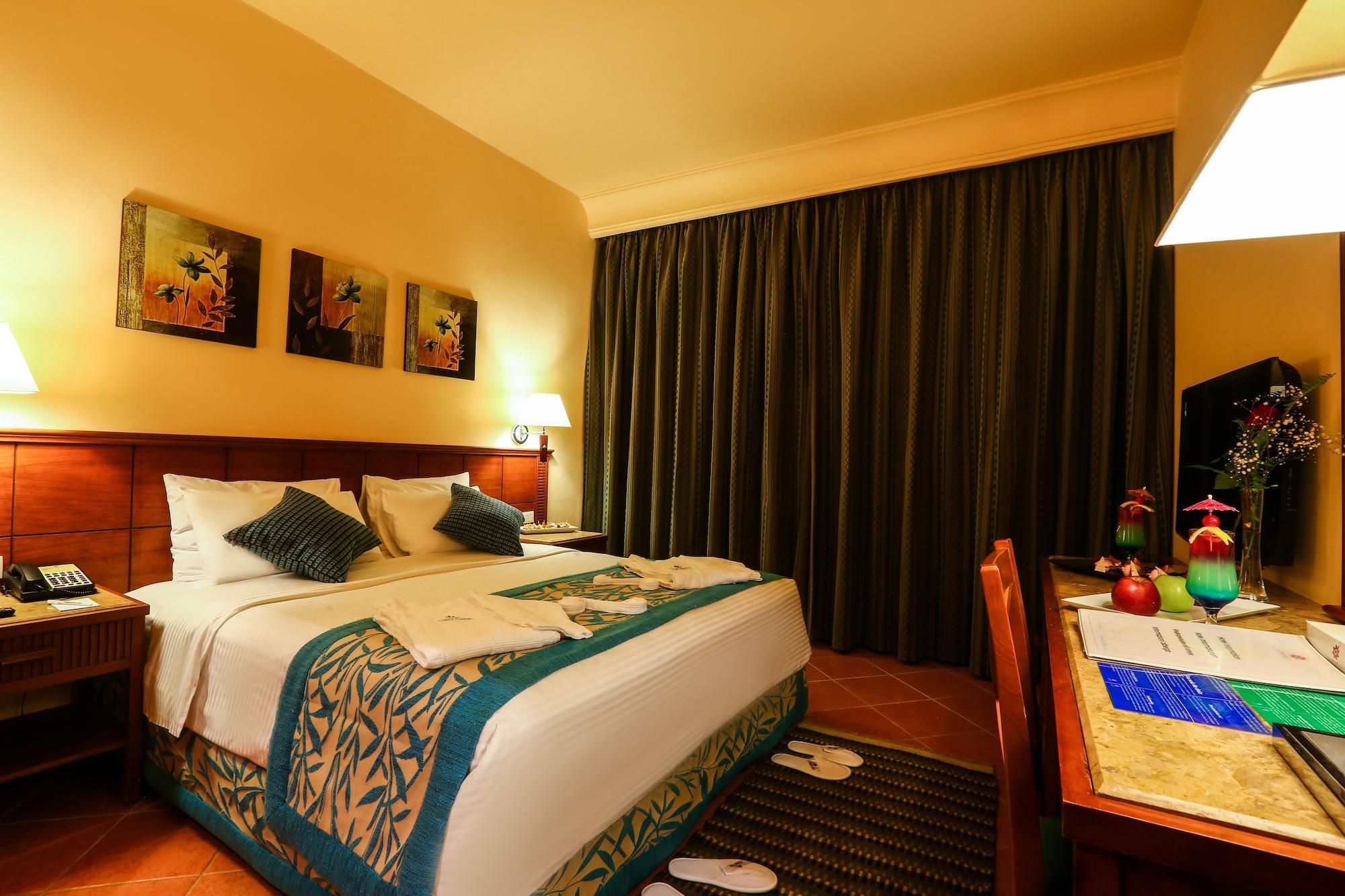 فندق Charmillion Club Aquapark شرم الشيخ المظهر الخارجي الصورة A bedroom at the hotel